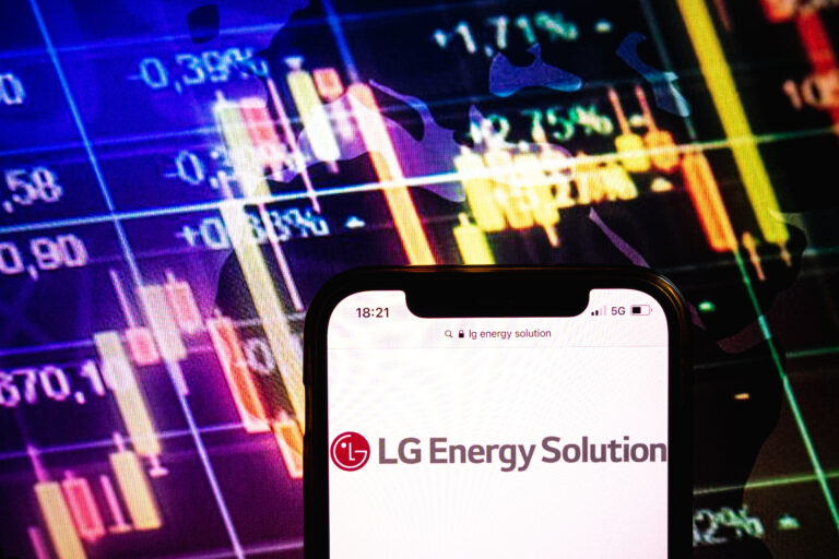 Konskie, poland august 09, 2022: smartphone displaying logo of lg energy solution company on stock exchange chart background