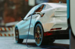 Ev electric car silhouette with low battery charging at electric