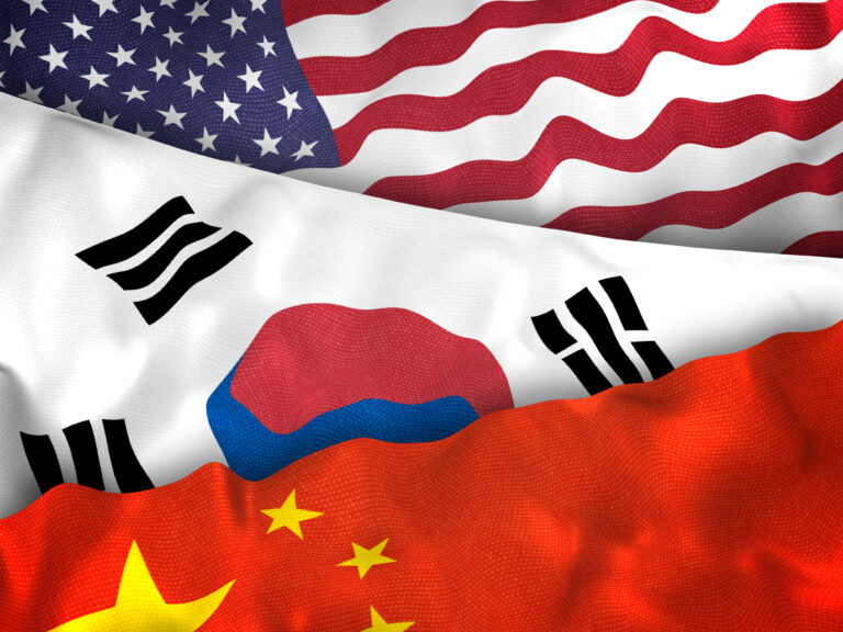 Illustration showing flags of usa, south korea, and china, symbolizing east asian diplomacy, military alliances, and complex regional relationships.
